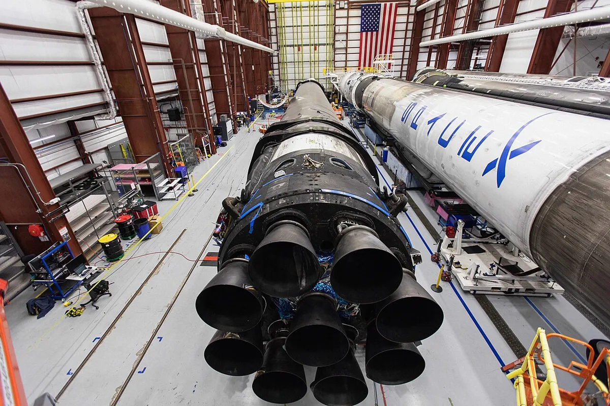 Falcon 9 B1046 and two unidentified boosters in the SpaceX Rocket Assembly Building at Kennedy Space Center LC-39A, October 2019