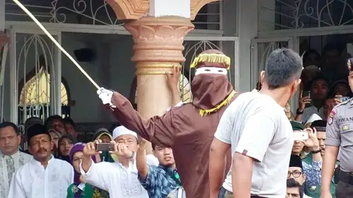 Indonesia Caned an Unmarried Couple 21 Times Each for a TikTok Kiss