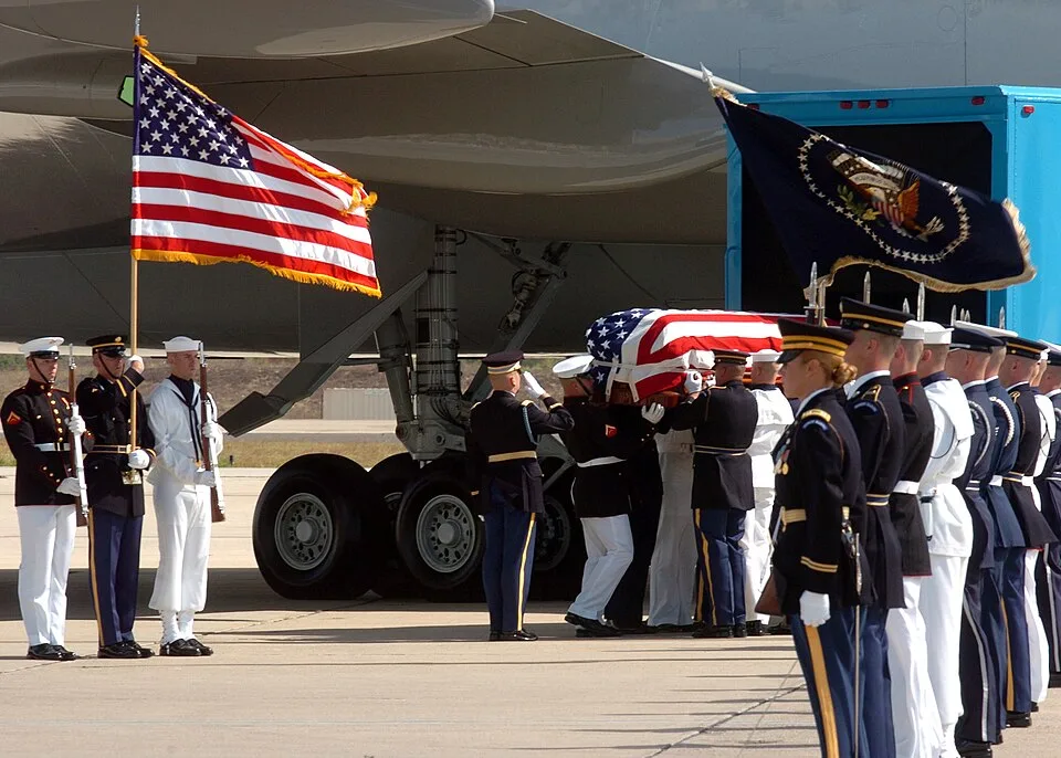 US Navy 040609-N-9712C-004 Ceremonial Honor Guardsmen place former President Ronald Reagan's flag-draped casket aboard a VC-25 Special Airlift Mission (SAM) 2800 Boeing 747 aircraft