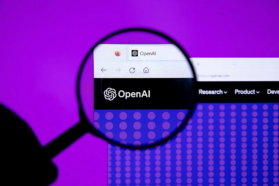 OpenAI logo with magnifying glass (52916339167)