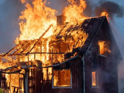 Six Kids Among Eight Dead in Michigan House Fire With Gunshot Wounds