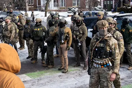 Judge Lets ICE Keep Its Masks, But NY Cops Don't Have to Help