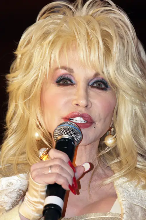 Dolly Got Off Her Deathbed to Sing. Bono Can't Even Listen.