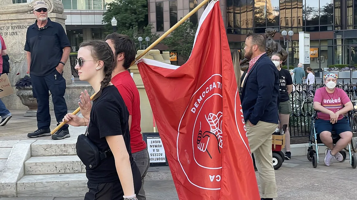 Columbus Abortion Democratic Socialists Flag Protester
