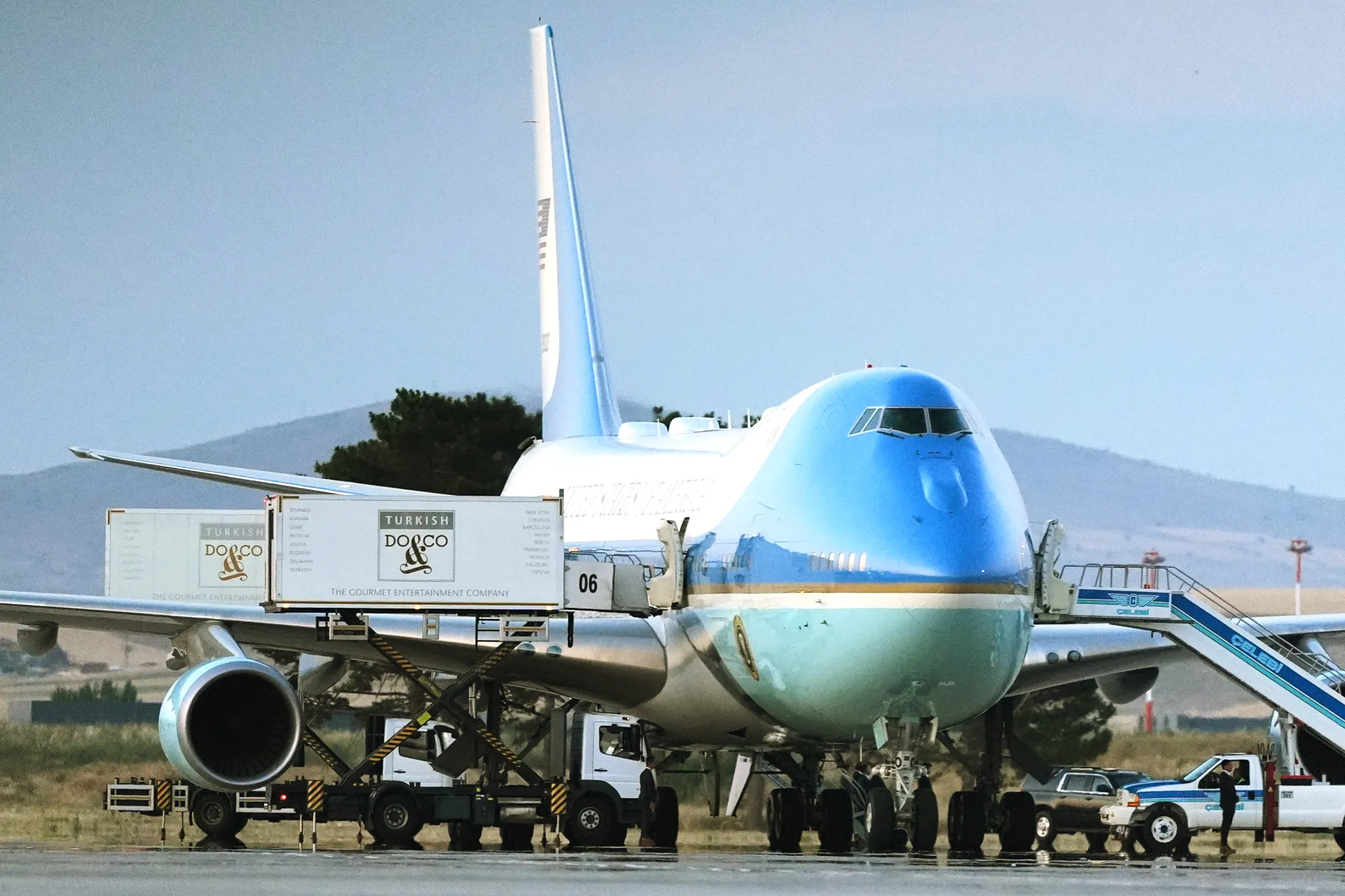 Air Force One on the tarmac in Ankara with catering trucks